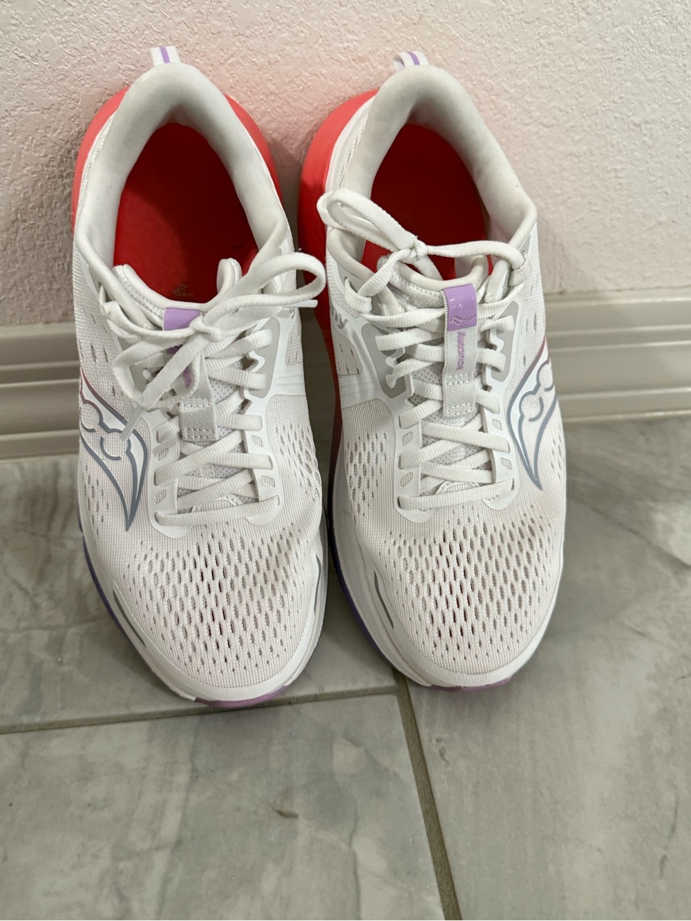 Saucony Guide 18 is a aWhite Running Shoes with Coral and Lavender Accents